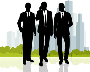 Businessmen at city background