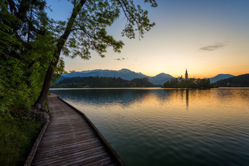 Naklejka na ściany i meble magical sunrise of Lake Bled with island