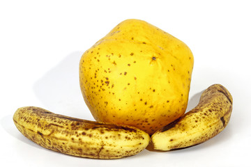 Yellow Paw Paw with Two Ripe Speckled Bananas