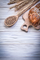 Chopping board wheat rye ears bread stick wood spoon corn crop