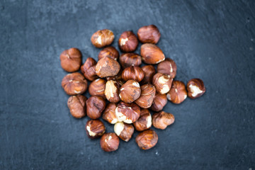 Hazelnuts on a slate slab