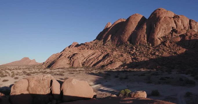 4K panning shot of the granite peaks of the Spitzkoppe mountains