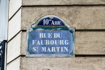 Paris old street sign Rue Du Fabourg St Martin
