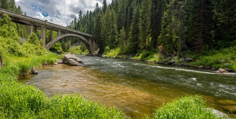 Zelfklevend Fotobehang Idaho forest and river with a unique bridge © knowlesgallery