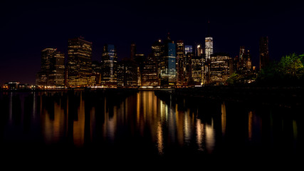 New York City skyline night with reflection