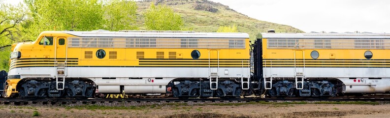 Train engine painted yellow and modern looking
