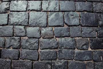 Stone pavement. Texture or background. Red square in Moscow.