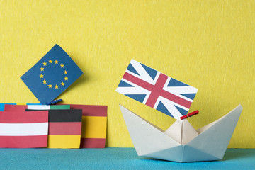 paper ship with british and european flag, concept shipment or free trade agreement and membership of eu, brexit