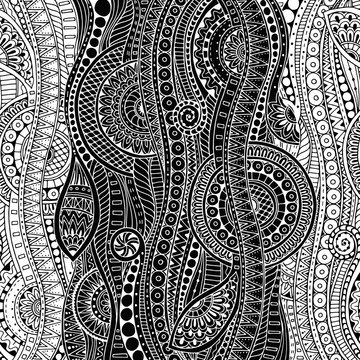 Ethnic floral zentangle, doodle background pattern in vector. Henna paisley mehndi doodles design tribal design element. Black and white pattern for coloring book for adults and kids.