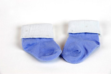 blue baby socks isolated on white background