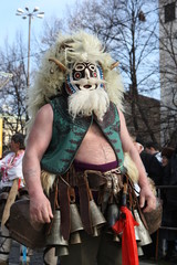 Pernik, Bulgaria - January 14, 2008: Unidentified man in traditional Kukeri costume are seen at the...