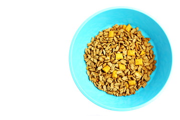 Cat food in blue bowl isolated on white background