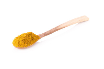Heap of curry powder, closeup, isolated on white background.