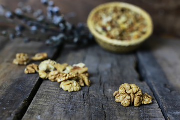 peeled walnut on a wooden background