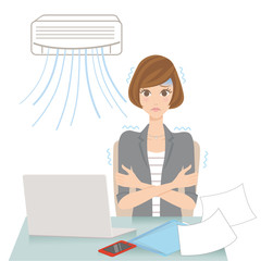 エアコンで冷える女性