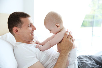 Father with adorable baby, close up