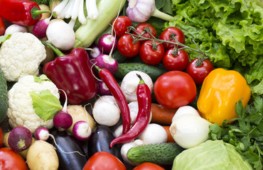 Background of fresh vegetables and greens closeup