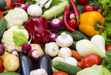 Background of fresh vegetables and greens closeup