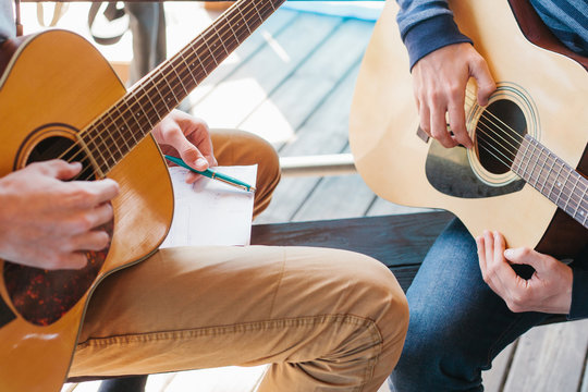 Learning to play the guitar. Music education and extra-curricular lessons.