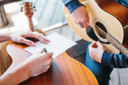 Learning to play the guitar. Music education and extra-curricular lessons.