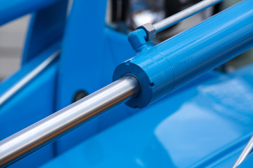 chrome-plated hydraulic mechanism close-up shot 