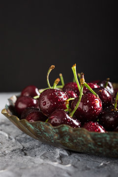 Fresh cherries with water drops.