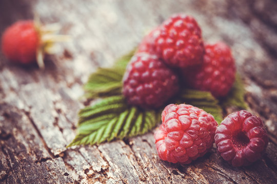 Fresh raspberry on a wooden table