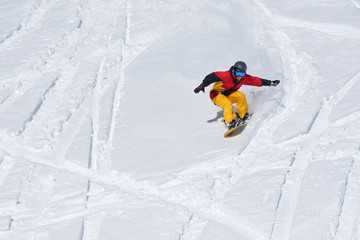 Snowboarder riding on loose snow Freeride