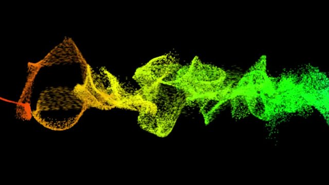 Particelle luminose colorate in fascio