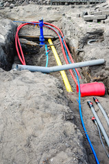 .Laying of underground cables and pipes in the residential const