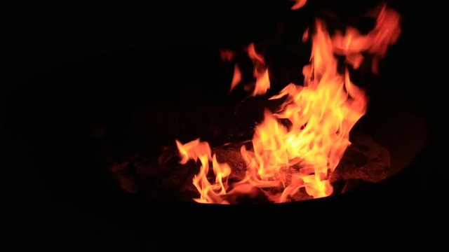 Bonfire burning trees at night. Bonfire burning brightly, heat, light,camping, big bonfire