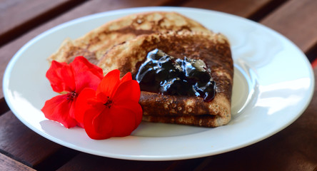 close-up Pancake  with marmalade and a cup of tea
