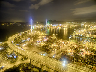 Fototapeta na wymiar Aerial view of Hong Kong Night Scene, Kwai Chung, Victoria Harbour, Stonecutters' Bridge 