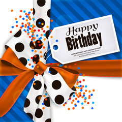 Happy birthday greeting card and text on tag, label, sticker. Orange bow, ribbon with black polka dots made from silk. Multicolored confetti. Vector.