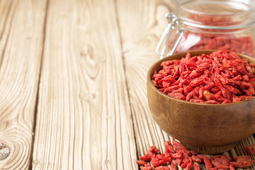Wooden bowl with  goji berries