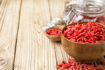 Wooden bowl with  goji berries