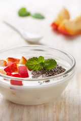 Yogurt with peach in  bowl