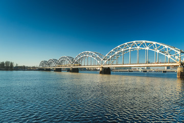 Obraz premium View of the Railway Bridge over Daugava in Riga, Latvia