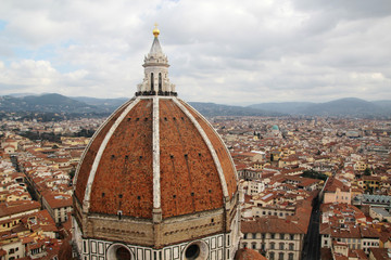 Fototapeta na wymiar View of the cupola of Il Duomo Cathedral from Campanile tower, Florence 