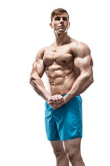 Fototapeta na wymiar Image of muscle man posing in studio