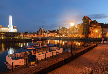 Scenery with boats in old town of Gdansk in the evening