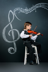 boy plays the violin