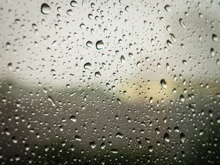 Selective focus, Raindrops on glass with city (raindrops,blur, rain)