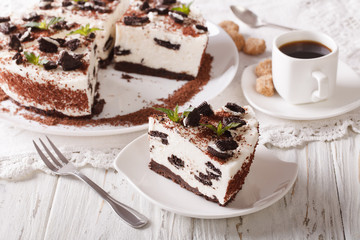 Beautiful dessert cheesecake with pieces of chocolate cookies close-up 
