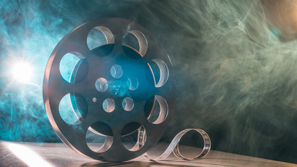Reel of film retro in the smoke green and blue