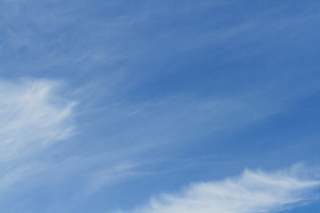 soft white clouds against blue sky