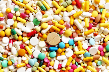 Fototapeta na wymiar A lot of colorful medication and pills from above