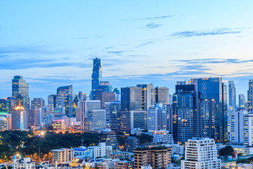 city center of Bangkok wooden floor. Panoramic and perspective view background of glass high rise building skyscraper commercial of future. Business concept of success industry tech architecture