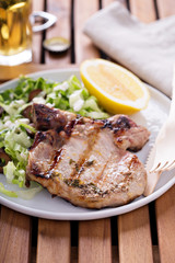 Grilled pork with salad