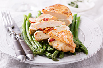 Grilled chicken breast stuffed with mozzarella